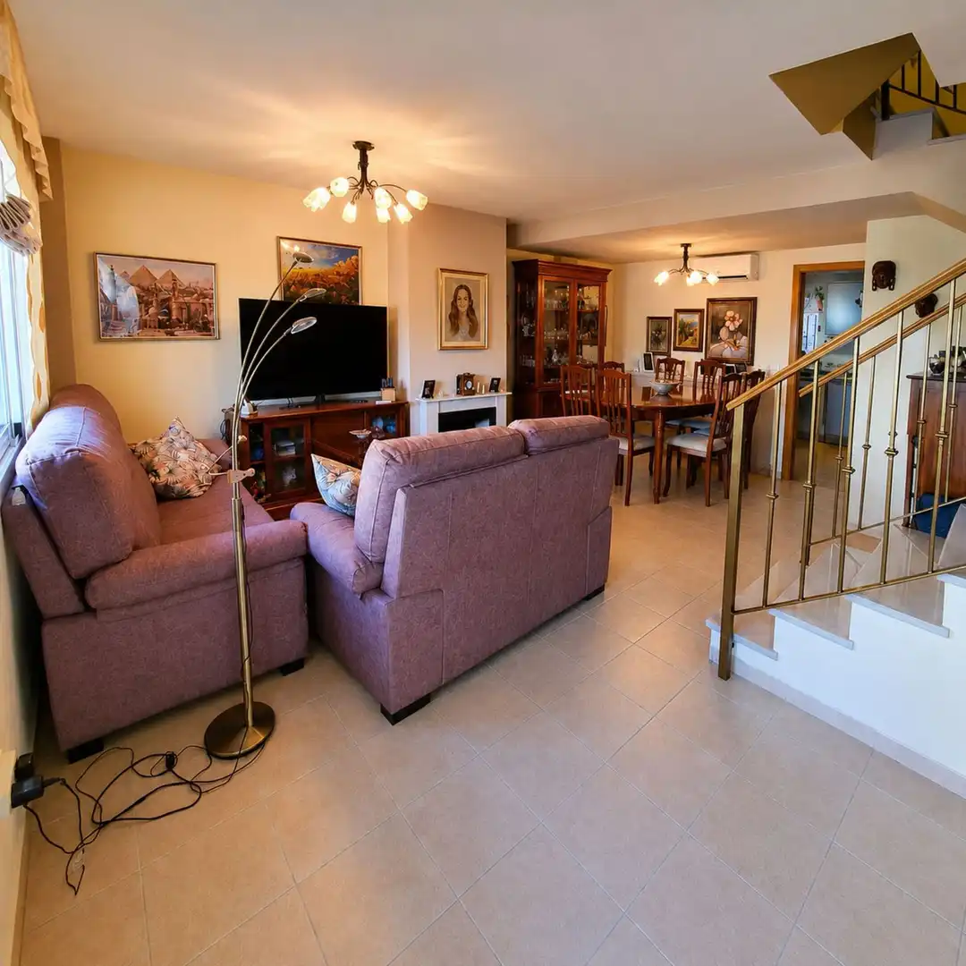 Sala de estar de Casa adosada en venta en Málaga con Aire acondicionado, Calefacción y Terraza