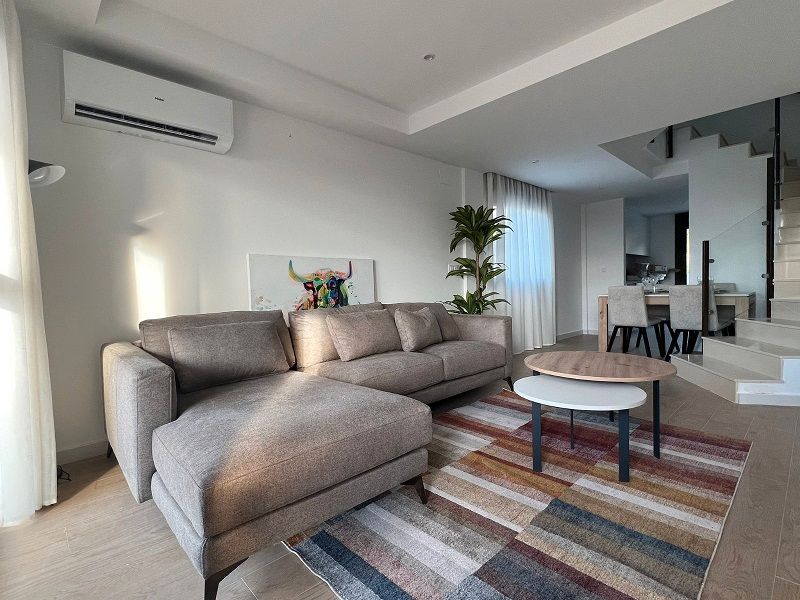 Sala de estar de Casa adosada en venta en La Unión con Terraza y Piscina comunitaria