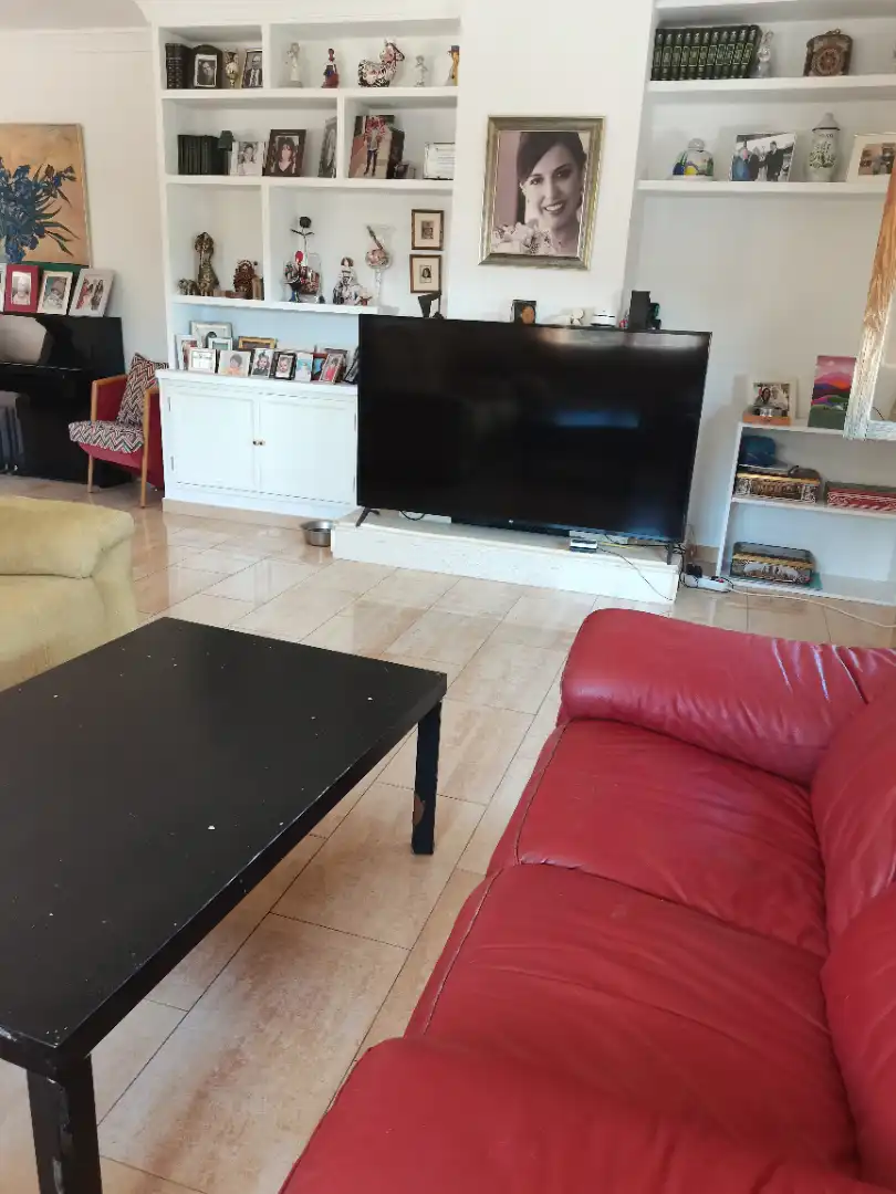 Sala d'estar de Casa o xalet en venda en Málaga amb Calefacció, Jardí privat i Parquet