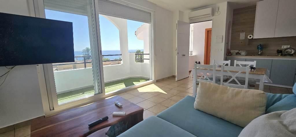 Sala d'estar de Apartament en venda en Mazarrón amb Aire condicionat, Jardí privat i Terrassa