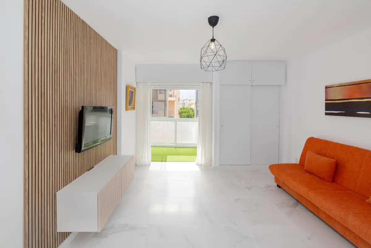 Sala de estar de Estudio en venta en Benalmádena con Calefacción, Jardín privado y Piscina
