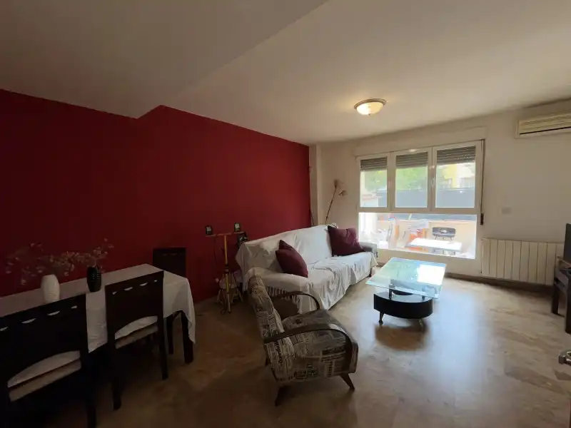 Sala de estar de Casa adosada en venta en Puçol con Aire acondicionado, Calefacción y Terraza