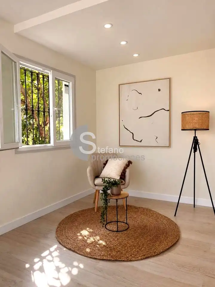 Sala d'estar de Casa o xalet en venda en Benalmádena amb Aire condicionat, Jardí privat i Terrassa