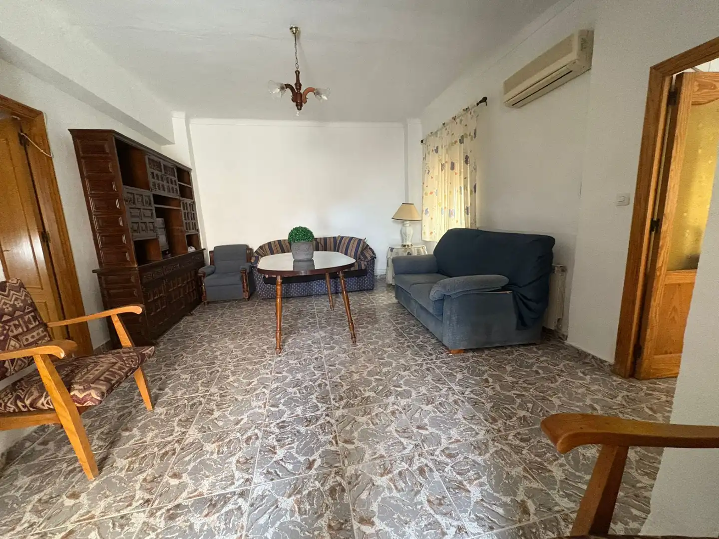 Sala de estar de Casa adosada en venta en Pozo Alcón con Amueblado