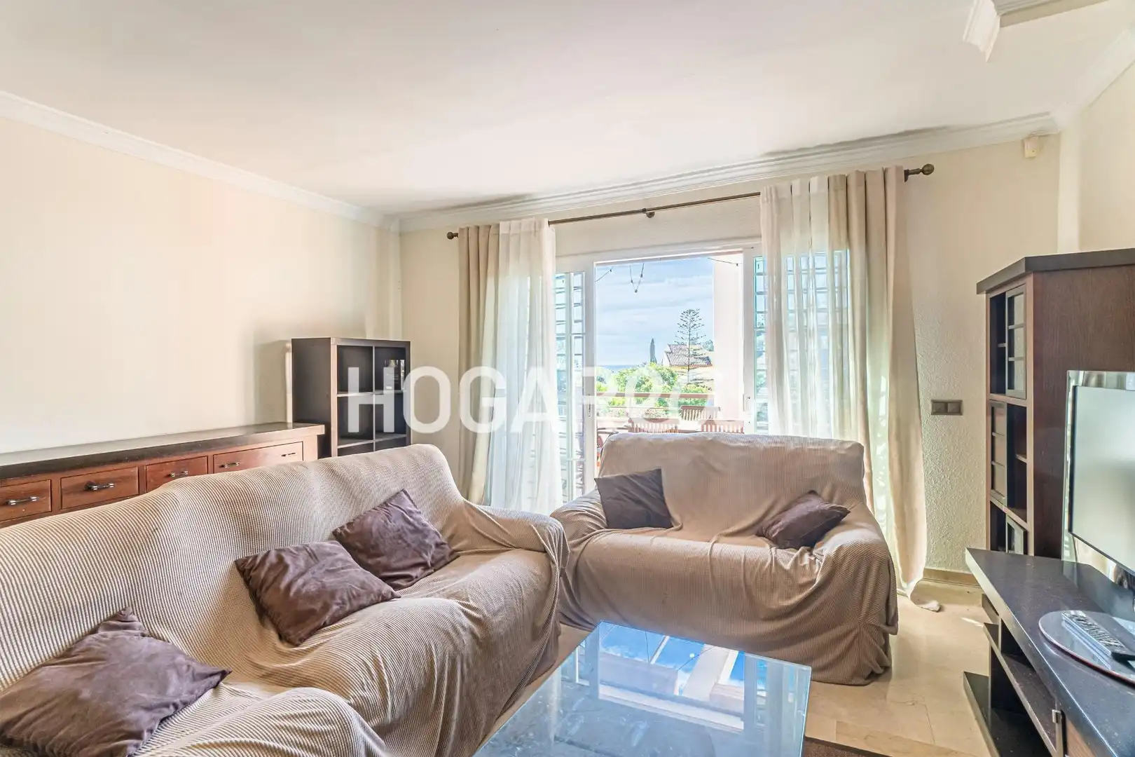 Sala de estar de Casa adosada en venta en Málaga con Aire acondicionado, Calefacción y Terraza