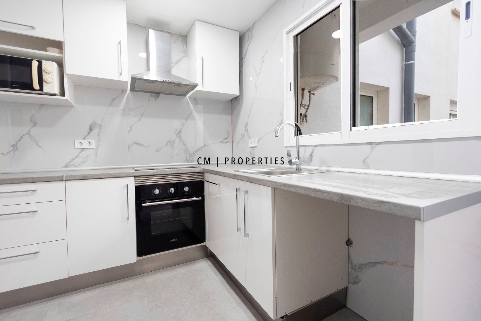 Cocina de Piso de alquiler en  Valencia Capital con Aire acondicionado y Terraza