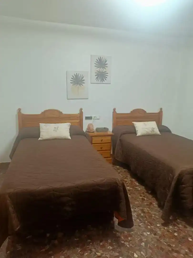 Dormitori de Casa adosada en venda en Alcalá la Real amb Aire condicionat i Balcó