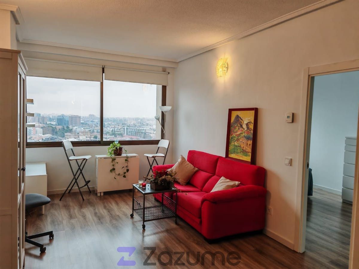 Sala d'estar de Àtic de lloguer en  Madrid Capital amb Aire condicionat, Calefacció i Parquet