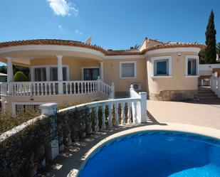 Vista exterior de Casa o xalet en venda en El Ràfol d'Almúnia amb Aire condicionat, Terrassa i Piscina