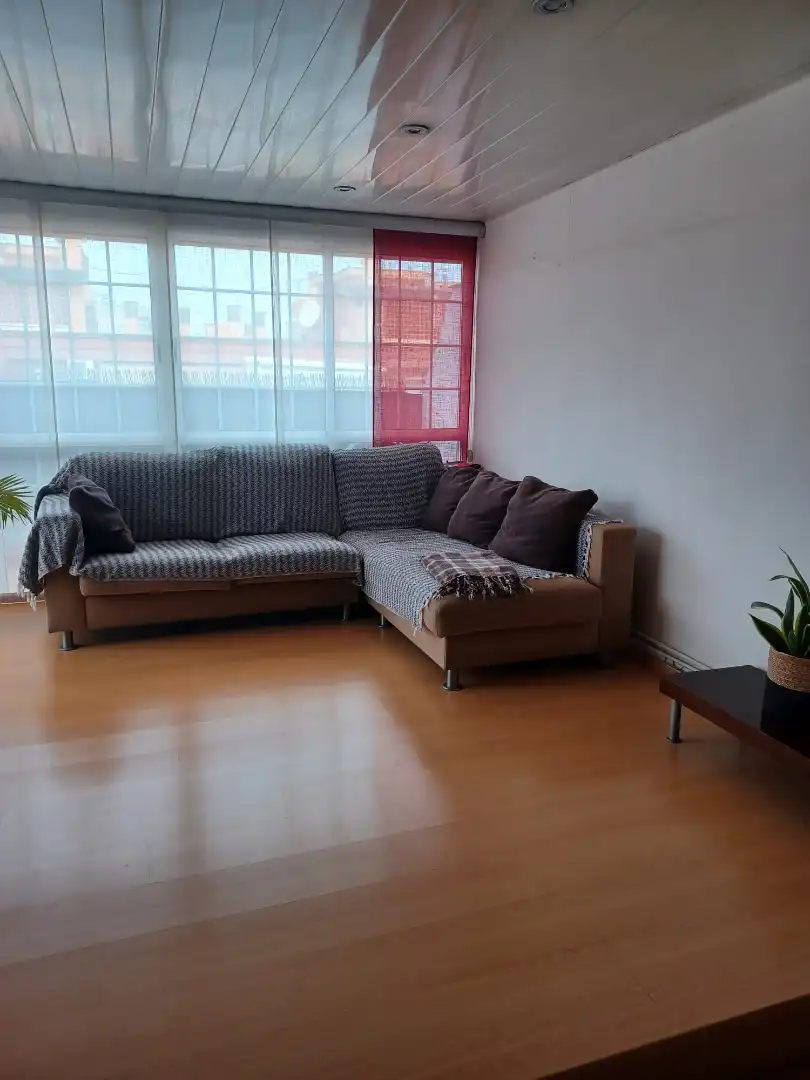 Sala d'estar de Àtic en venda en L'Hospitalet de Llobregat amb Aire condicionat, Calefacció i Terrassa