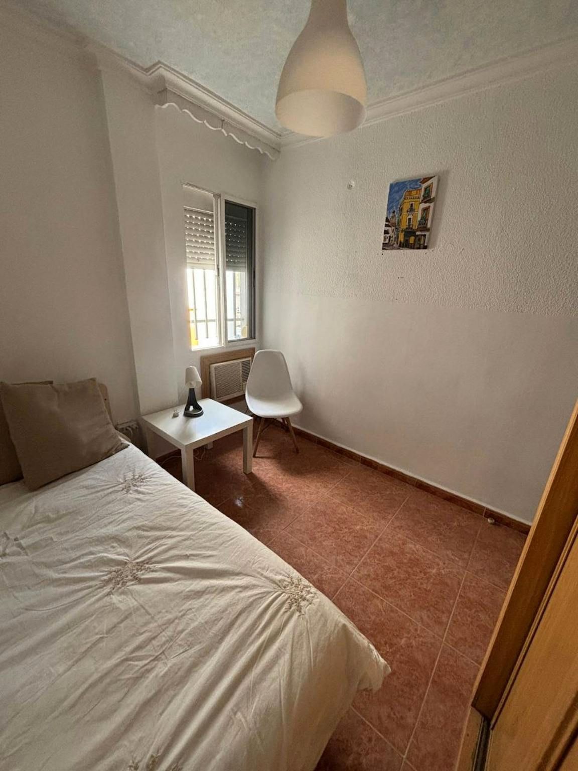 Bedroom of Flat to share in  Sevilla Capital  with Air Conditioner and Washing machine