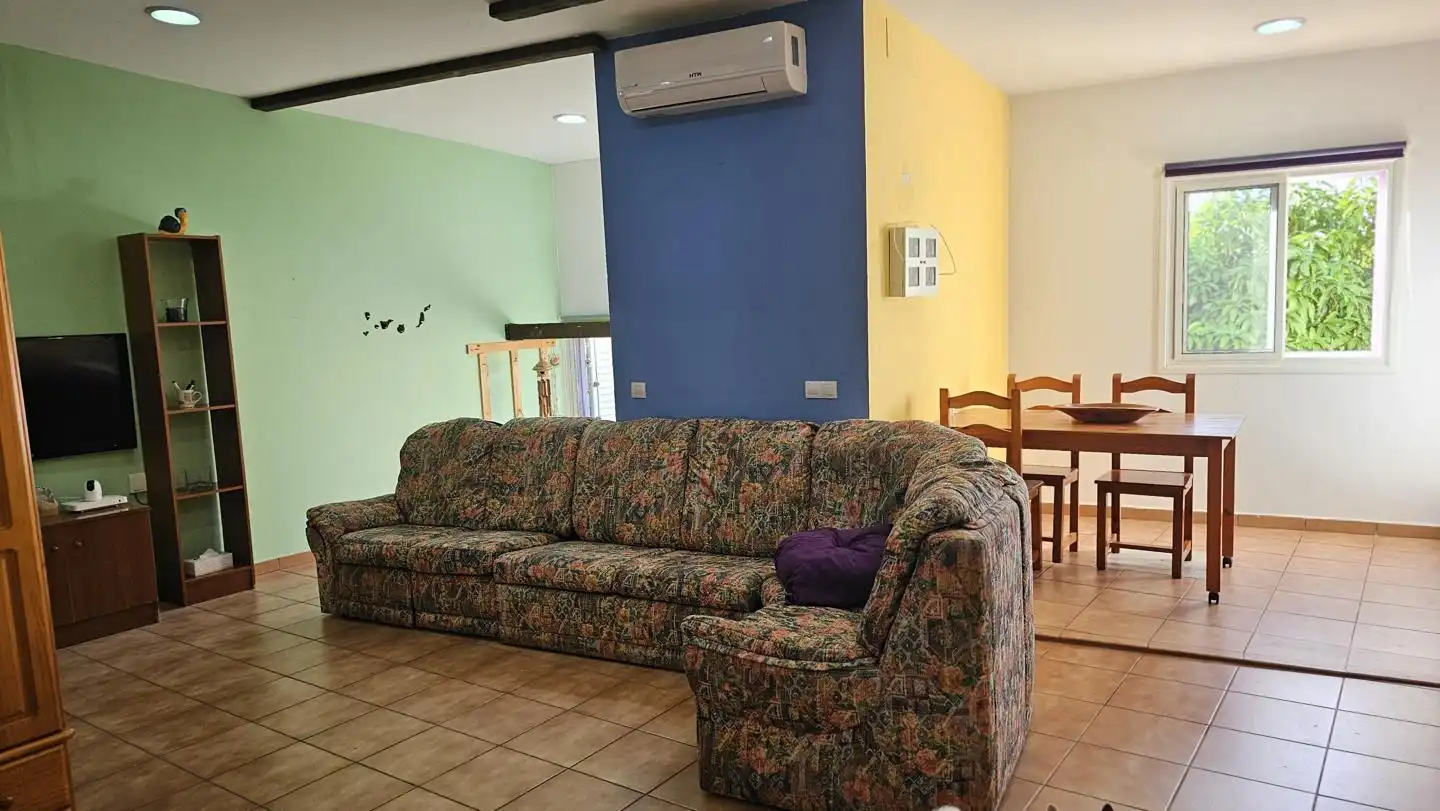 Sala d'estar de Casa o xalet en venda en Santa Lucía de Tirajana amb Jardí privat, Terrassa i Piscina