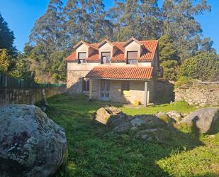 Vista exterior de Casa o xalet en venda en A Pobra do Caramiñal amb Jardí privat, Traster i Balcó