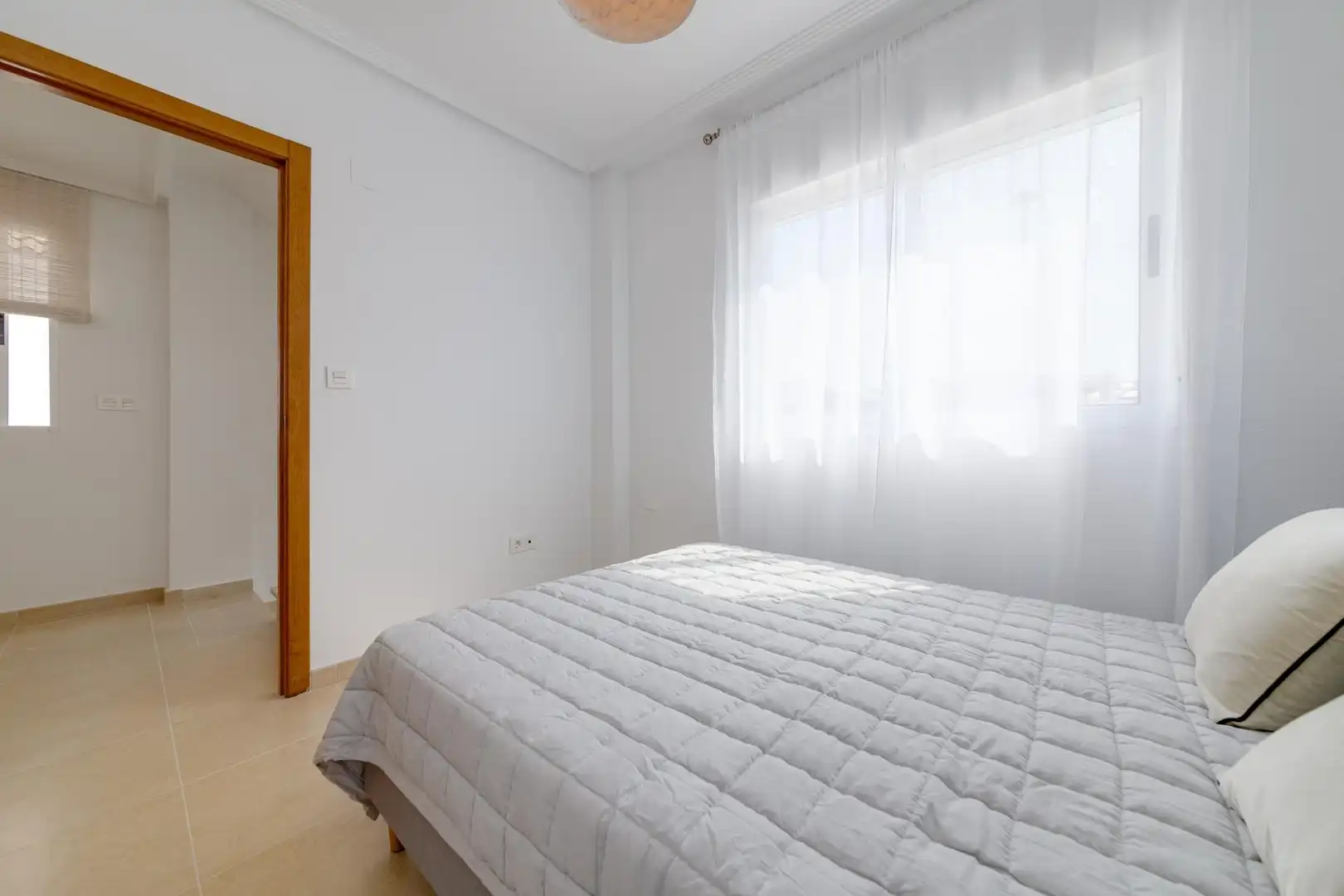 Habitación de Casa adosada en venta en San Fulgencio con Jardín privado, Terraza y Piscina comunitaria