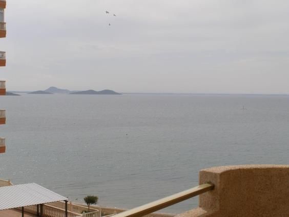 Dormitori de Apartament de lloguer en La Manga del Mar Menor amb Jardí privat, Terrassa i Piscina