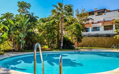 Swimming pool of Planta baja for sale in Vélez-Málaga  with Air Conditioner, Terrace and Community pool