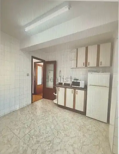 Kitchen of Flat for sale in Gijón   with Heating, Terrace and Storage room