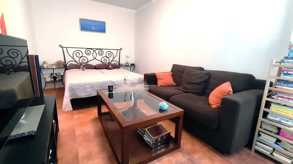 Sala de estar de Casa adosada en venta en Dénia con Aire acondicionado, Calefacción y Jardín privado