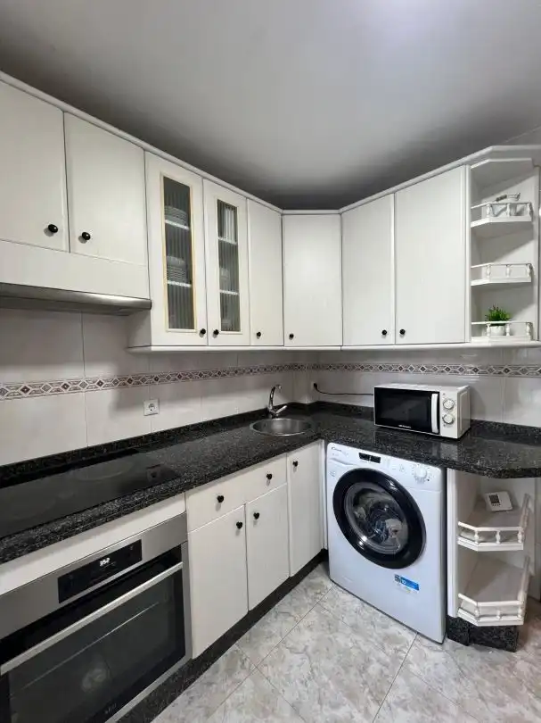 Kitchen of Flat for rent in Gijón   with Heating and Terrace