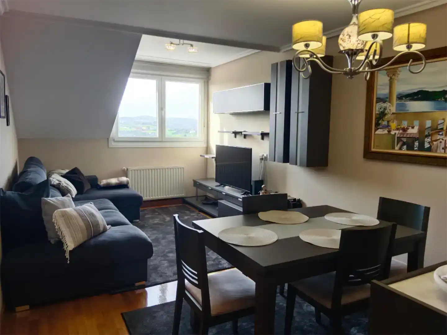 Living room of Flat for rent in Carreño  with Parquet flooring, Furnished and Oven