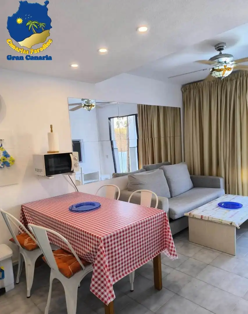 Sala de estar de Casa adosada en venta en Mogán con Jardín privado, Terraza y Amueblado
