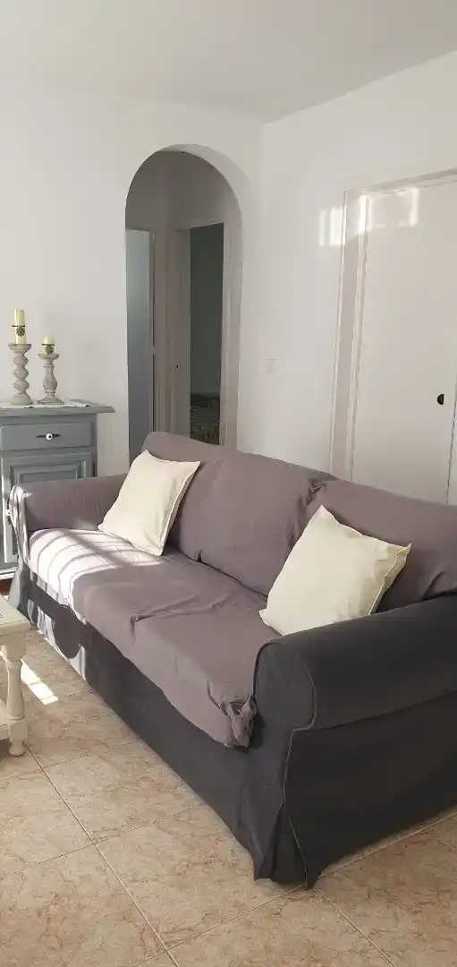 Sala d'estar de Casa adosada de lloguer en Mazagón amb Jardí privat, Moblat i Forn