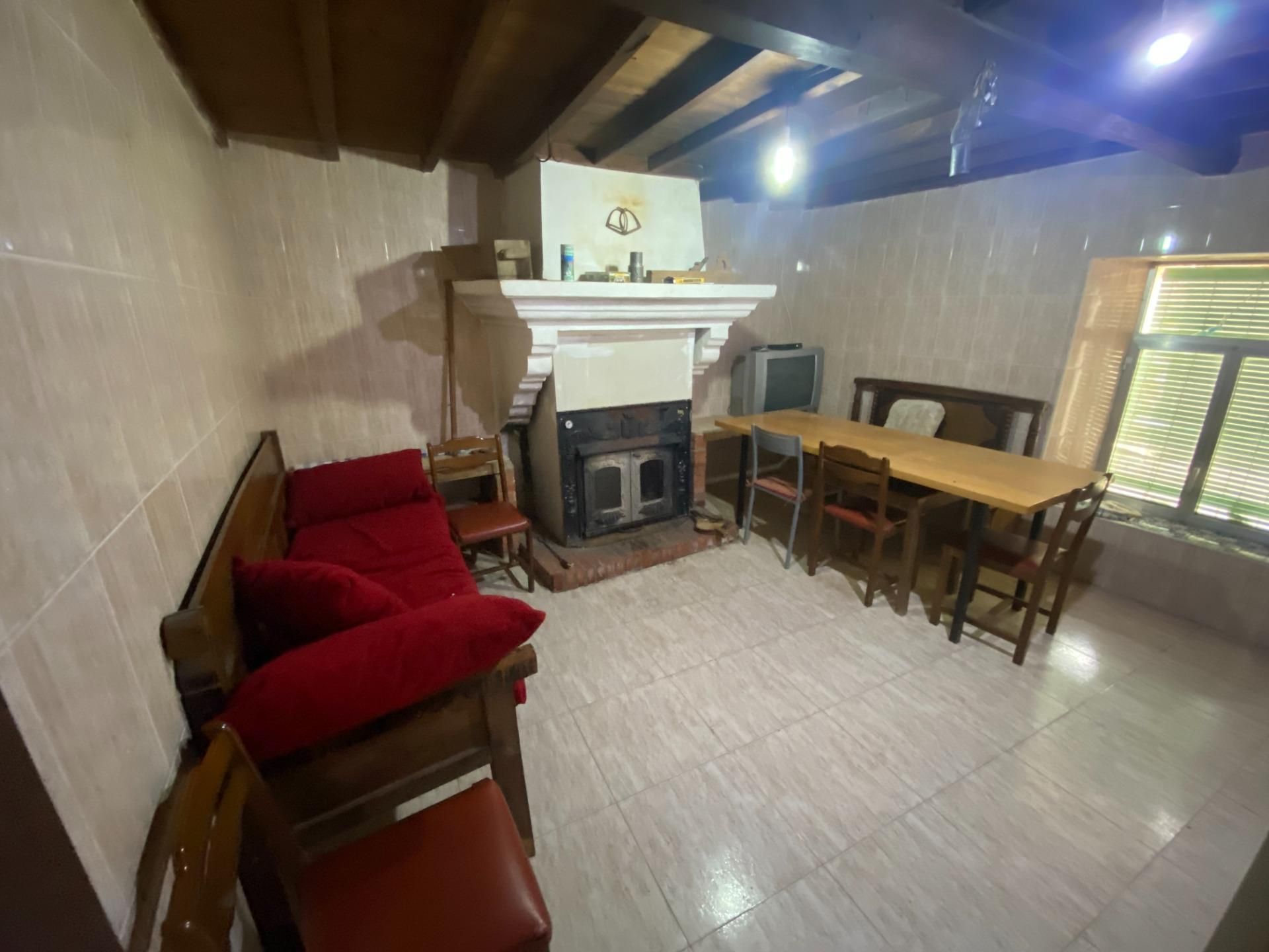 Sala d'estar de Casa o xalet en venda en Escurial de la Sierra amb Calefacció