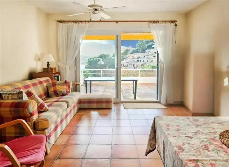 Sala de estar de Casa adosada en venta en Capdepera con Calefacción, Terraza y Piscina comunitaria