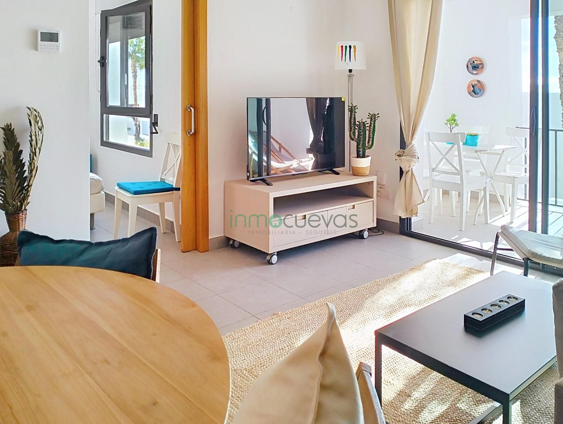 Living room of Flat for sale in Mojácar  with Air Conditioner, Private garden and Terrace