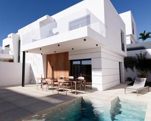 Exterior view of Single-family semi-detached for sale in Pulpí  with Private garden and Swimming Pool