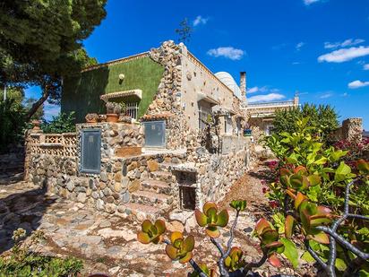 Vista exterior de Casa o xalet en venda en Mazarrón amb Aire condicionat, Calefacció i Jardí privat