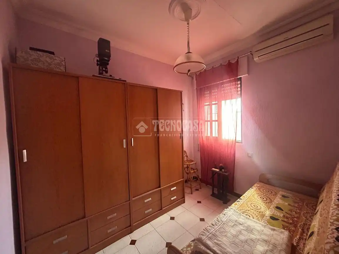 Habitación de Casa adosada en venta en Huelva con Aire acondicionado
