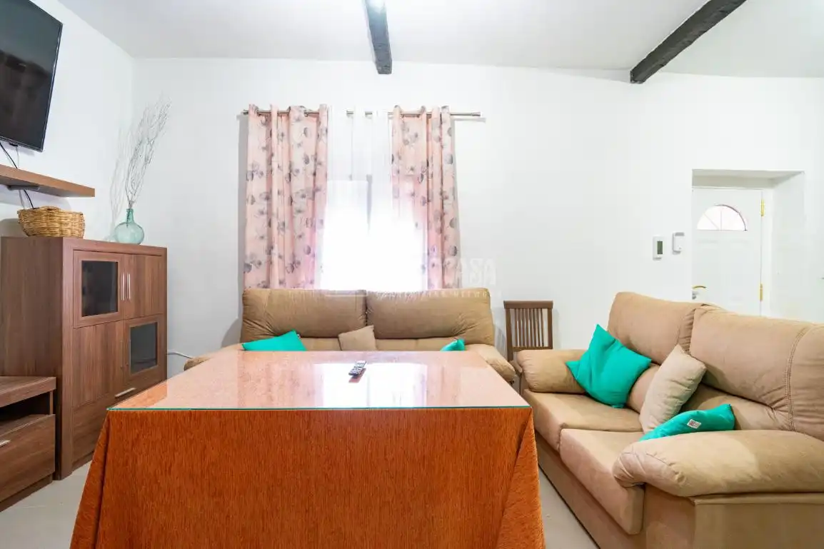 Sala de estar de Casa adosada en venta en Cogollos de la Vega