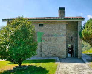 Vista exterior de Casa o xalet en venda en O Pereiro de Aguiar  amb Calefacció, Jardí privat i Terrassa