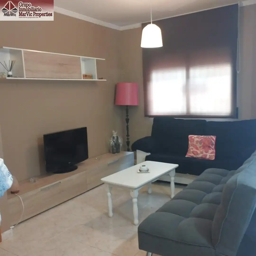 Sala de estar de Apartamento en venta en Benidorm con Jardín privado, Amueblado y Piscina comunitaria