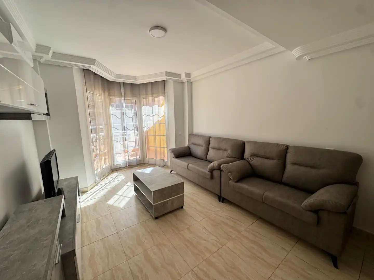 Sala d'estar de Casa adosada de lloguer en Roquetas de Mar