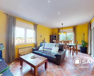 Living room of House or chalet for sale in L'Escala  with Air Conditioner, Heating and Terrace