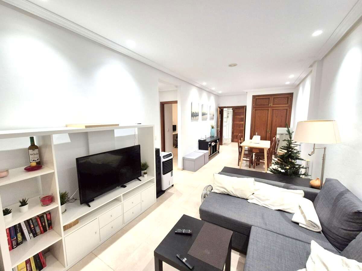 Sala d'estar de Apartament en venda en Tías amb Aire condicionat, Terrassa i Moblat