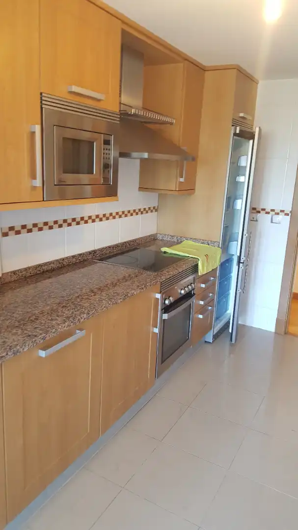 Cuina de Apartament en venda en Poio amb Calefacció, Terrassa i Traster