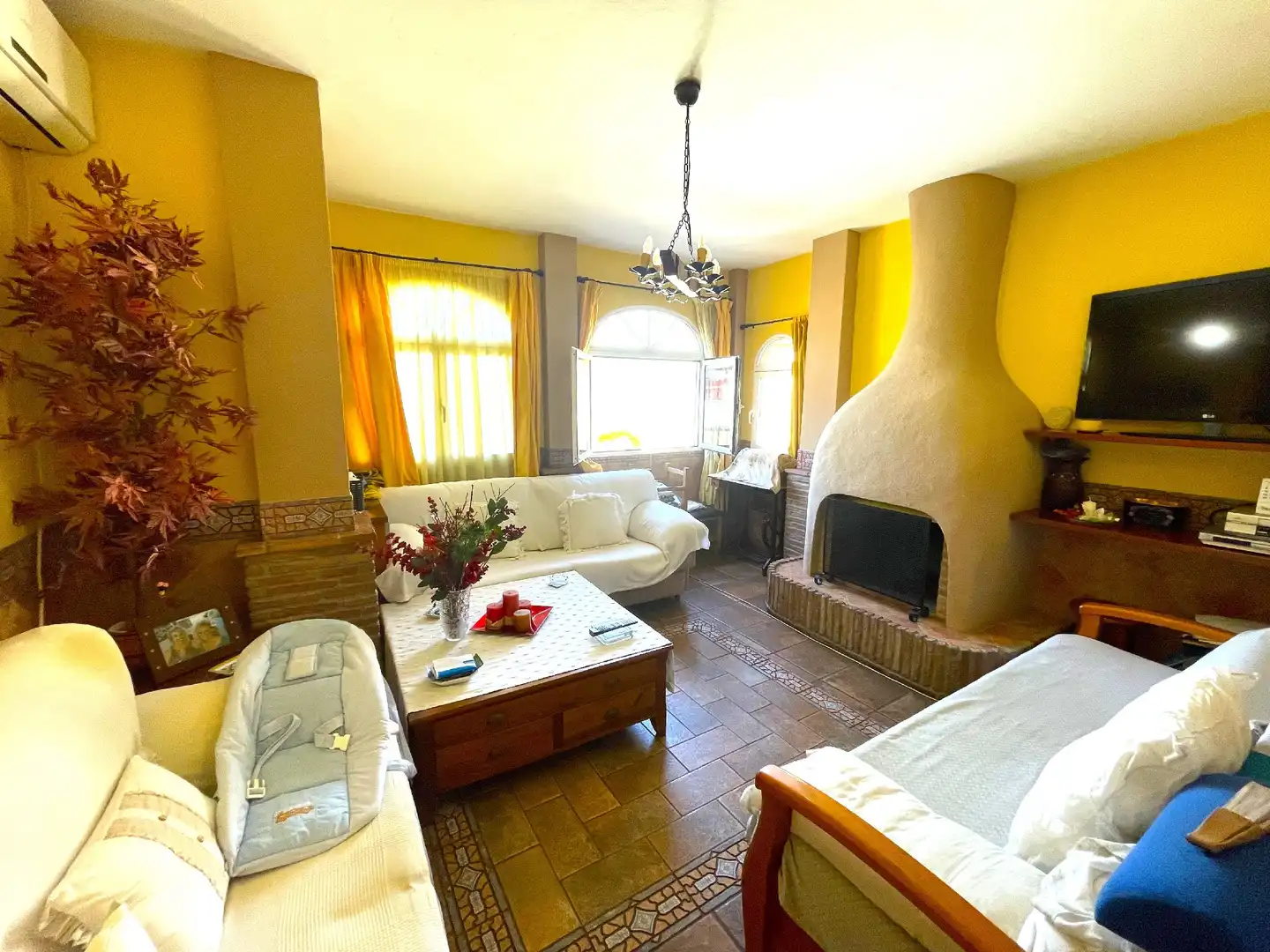 Sala d'estar de Casa adosada en venda en Málaga