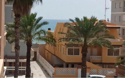 Exterior view of Flat for sale in Tavernes de la Valldigna  with Air Conditioner, Furnished and Oven