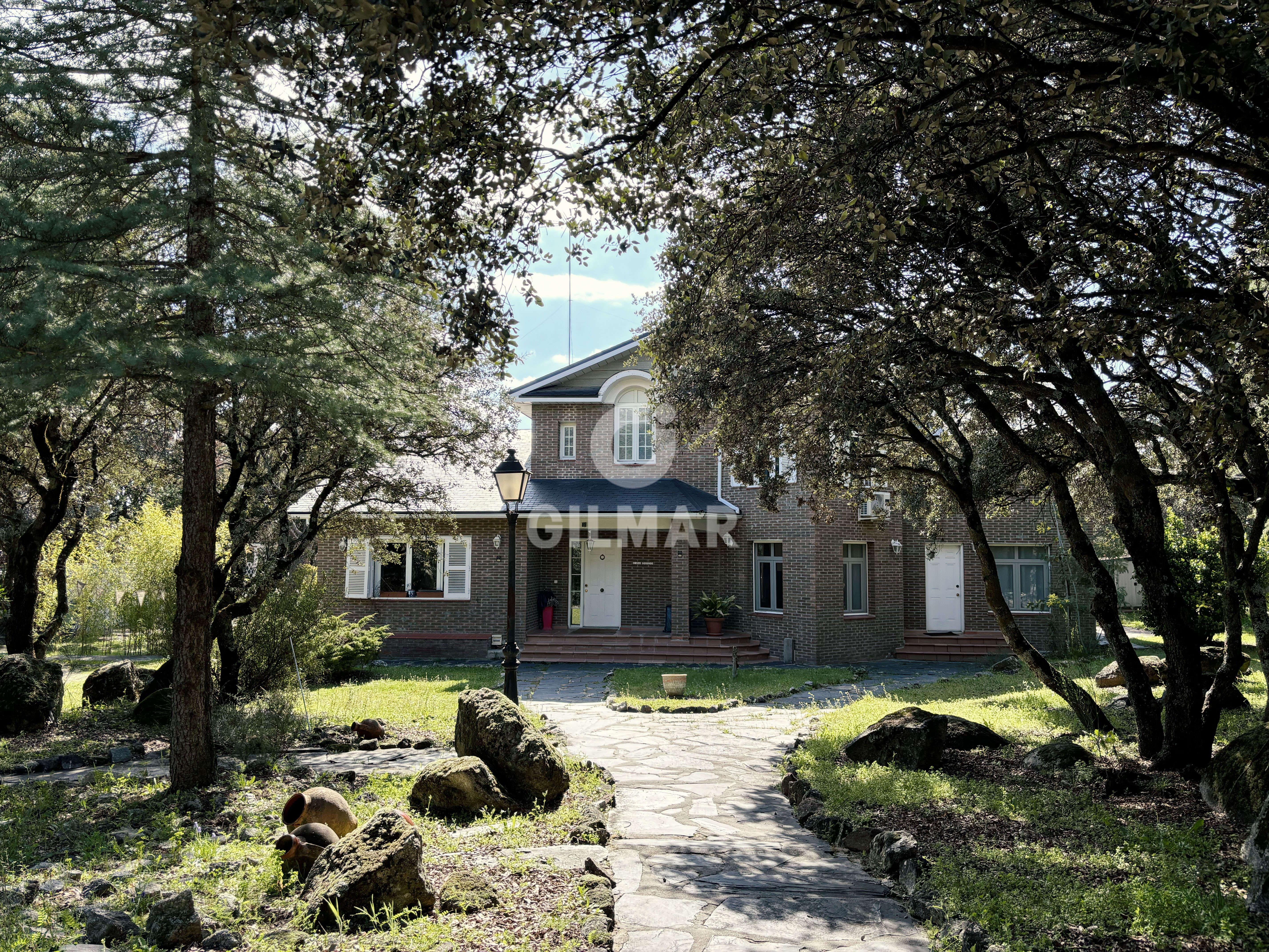 Vista exterior de Casa o xalet en venda en El Escorial amb Calefacció i Jardí privat