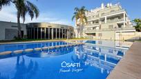 Exterior view of Flat for sale in Oliva  with Air Conditioner, Terrace and Swimming Pool