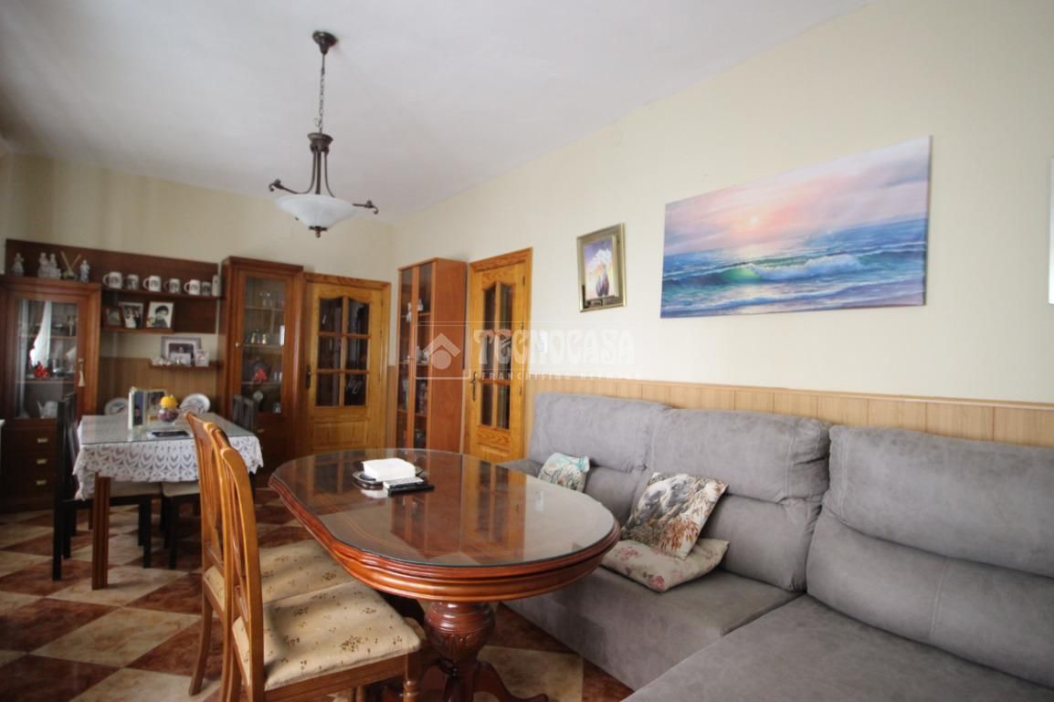 Sala d'estar de Casa adosada en venda en Churriana de la Vega