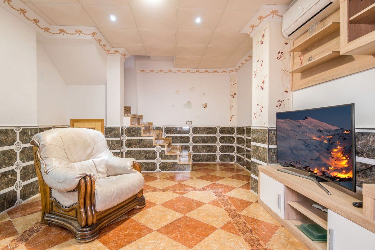 Sala d'estar de Casa adosada en venda en Alhendín amb Terrassa i Traster