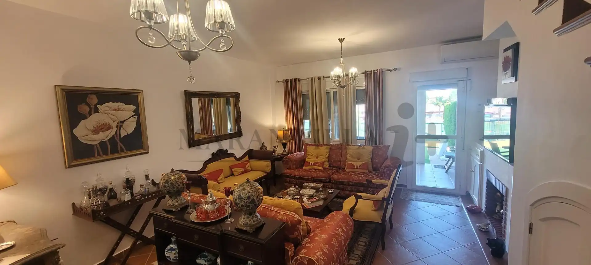 Sala de estar de Casa adosada en venta en Islantilla con Aire acondicionado, Calefacción y Jardín privado