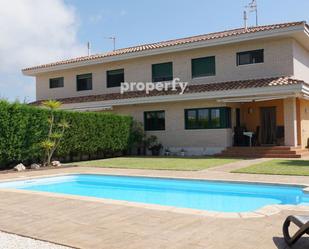 Exterior view of Single-family semi-detached for sale in L'Ampolla  with Air Conditioner, Terrace and Swimming Pool