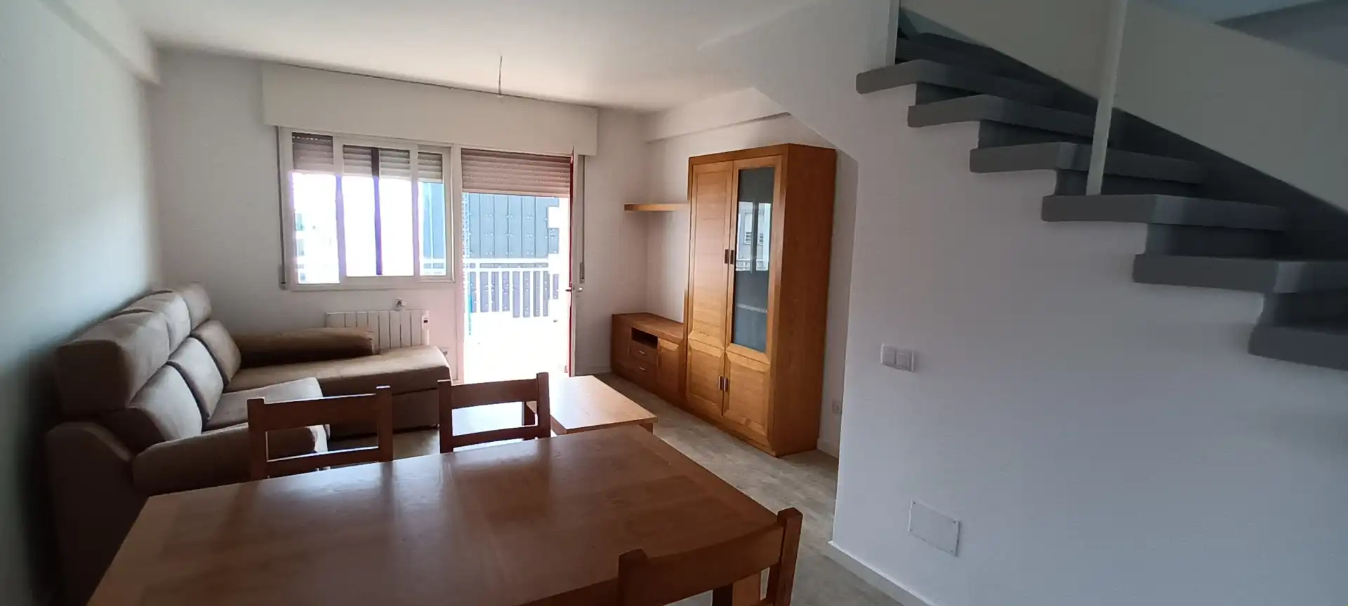 Sala de estar de Dúplex en venta en Sanxenxo con Terraza, Balcón y Piscina comunitaria