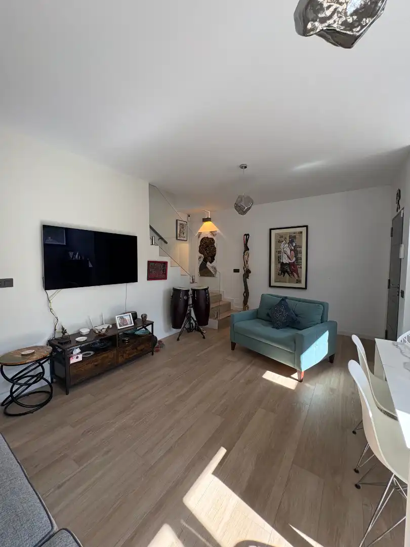 Sala d'estar de Casa adosada en venda en Alcantarilla amb Aire condicionat, Terrassa i Traster