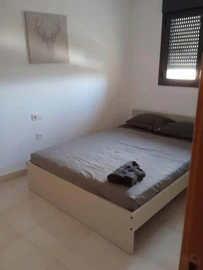 Dormitori de Pis de lloguer en Benidorm amb Aire condicionat, Piscina i Moblat